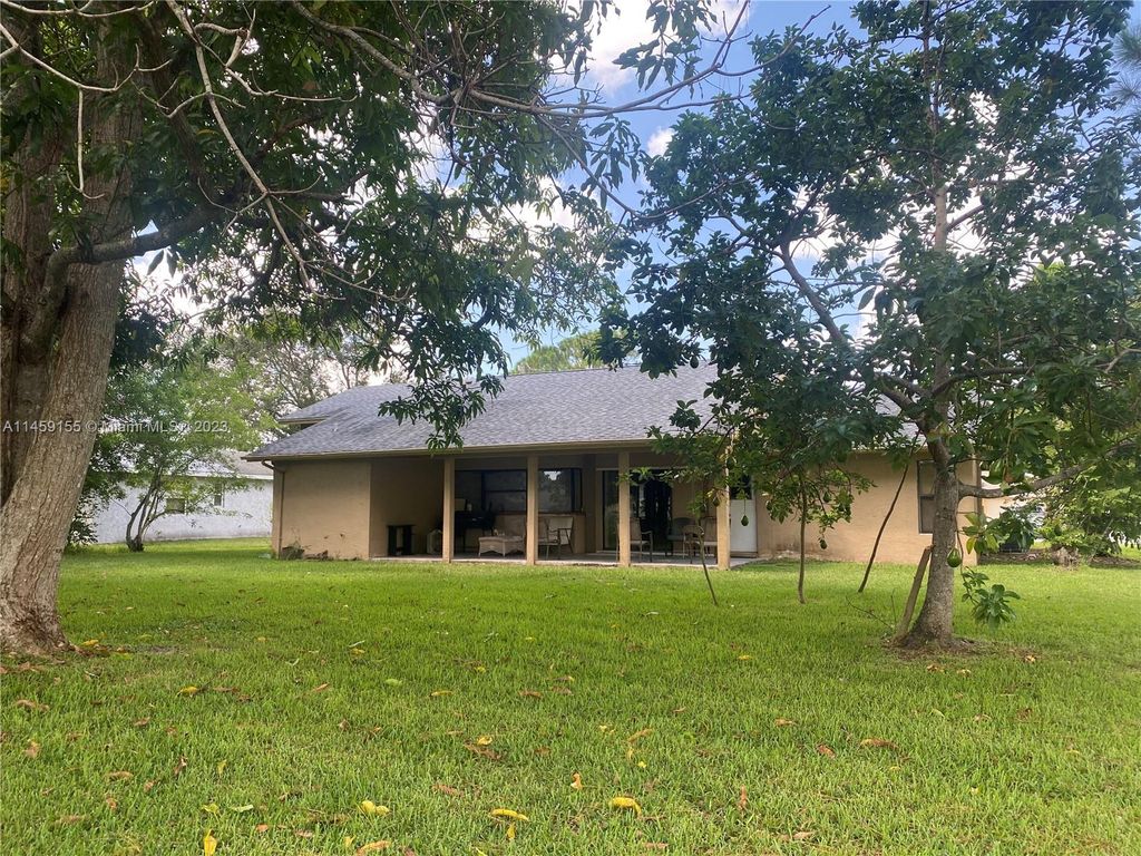 Photo of 1601 SE Nancy Ln, Port Saint Lucie, FL 34983 (MLS # A11459155)