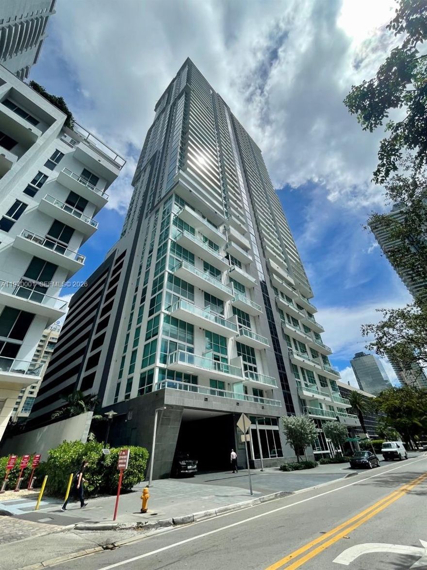 Spectacular 2 bedroom corner unit at The Bond. Ample bright unit with tile floors, upgraded closet cabinets and window treatments. Full service building with valet parking, full fitness center, party room, resort style pool featuring private cabanas with BBQ grills and seating areas.