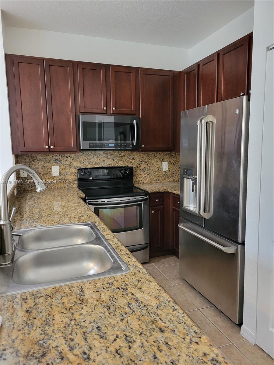 VILLAGE WALK CONDO - Residential