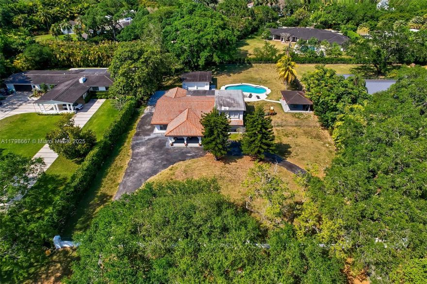 Seize this exceptional opportunity to craft your dream estate on a spacious 37,897 sq ft lot (just under 1 acre) in the coveted Pinecrest community. Nestled in North Pinecrest, this expansive property offers endless possibilities for creating a bespoke home tailored to your vision, blending luxury with the area’s signature tranquility. Renowned for its elegant residences, top-tier schools, and welcoming vibe, this location delivers the perfect balance of seclusion and convenience. Enveloped by lush, established greenery, the lot promises a private retreat while remaining moments away from premier amenities, including exceptional dining, boutique shopping, scenic parks, and recreational hotspots. Act now to secure your place in one of Miami’s most sought-after enclaves.