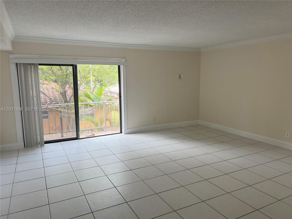 Photo of 3750 NW 115th Way #11-1, Coral Springs, FL 33065 (MLS # A12001368)