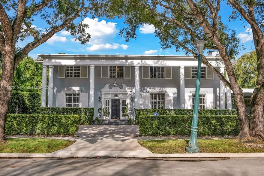 Elegant home on Grand Concourse in Miami Shores.  Walkable to downtown Miami Shores, the library, cafes, shops, and restaurants & 5 minutes to Miami Country Day School, and 6 minutes to JLA.  2 Story, 6 bedrooms plus office.  5.5 baths.  If you have a live-in nanny, this home provides a perfect nanny's quarters or in-laws/guest area.  Huge formal entry foyer with an open circular staircase.  Formal living room with fireplace, huge dining room & big family room open to the kitchen.  White kitchen with large island, perfect for cooking & entertaining.  Big playroom for the kids adjacent to the nanny's quarters.  More than 16,000 sq ft lot with pool, garden area, play area, and covered patio.  Newer roof, newer central A/C, plumbing and electricity are updated.  Move-in condition.