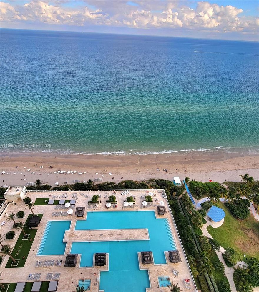 THIS BEACH CLUB OCEANFRONT RESIDENCE IS TRULY A HOME YOU CAN ENJOY!  SPACIOUS IS AN UNDERSTATEMENT This 1 Bedroom, w Den and Full Bathroom has Floor To Ceiling Sliding Glass Doors in the Bedroom and Living Room Letting in Plenty of Natural Light. You will  Feel Pampered as you Treat Yourself to a Soothing Soak in the Jetted Spa Tub- Shower Combination.  Relax and be Swayed in Your Hammock On The Balcony As The Most Awesome Sunset Unfolds Before You! - There's Always Something To See!  The Condo has A Washer/Dryer, Storage and Under Building Assigned Parking.   IF THIS ALL WASN'T ENOUGH ENJOY THE PRIVATE BEACH ACCESS, 5 Heated Pools, Fitness Centers, Sauna , Cold Plunge Pool and So Much More!  Schedule A Massage and other Services at the Private Residents Only Spa....It's All Here!  The Location Without Saying Is The Best ~ Close To Everything and Between Fort Lauderdale and Miami.