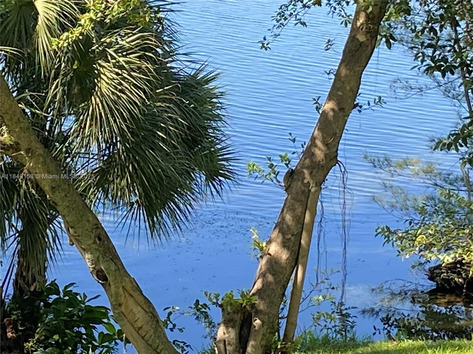 Beautiful lake views from this large 1 bed, 2 bath unit in a secure, 24/7 gated community in Hialeah Gardens. Featuring a pool, large balcony, extra closet space, good size kitchen and bathrooms, along with the convenience of in-unit laundry, this spacious home combines comfort with peace of mind. A fantastic opportunity for investors property is leased throw Hialeah Housing (SEC 8) for $1800 per month NO SPECIAL ASSESSMENT LOW HOA ASSOCIATION $210 MONTHLY