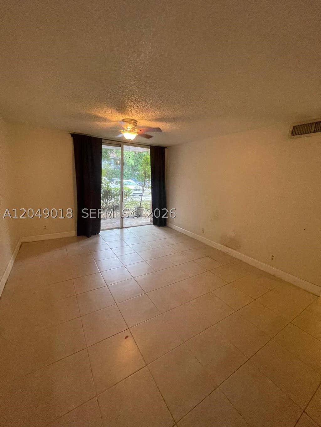 Photo of 10773 Cleary Blvd #103, Plantation, FL 33324 (MLS # A12049018)