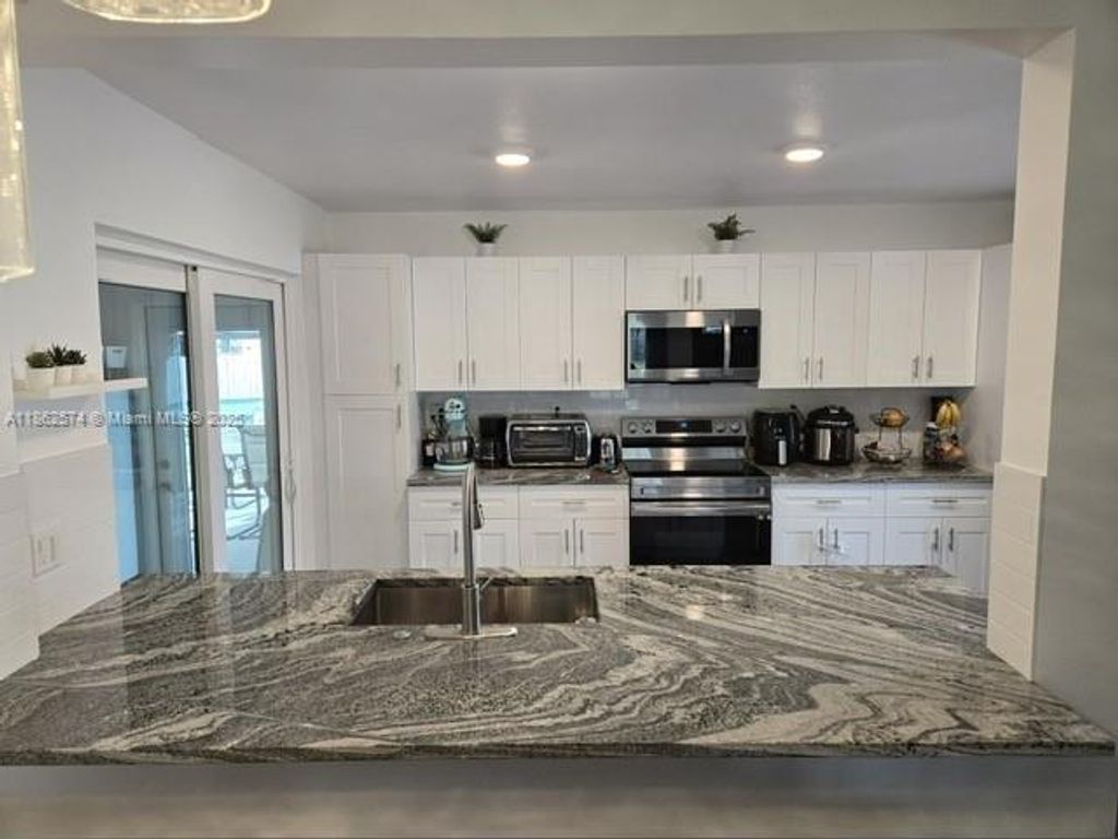 Photo of 903 NW 6th Ave #0, Boynton Beach, FL 33426 (MLS # A11862574)