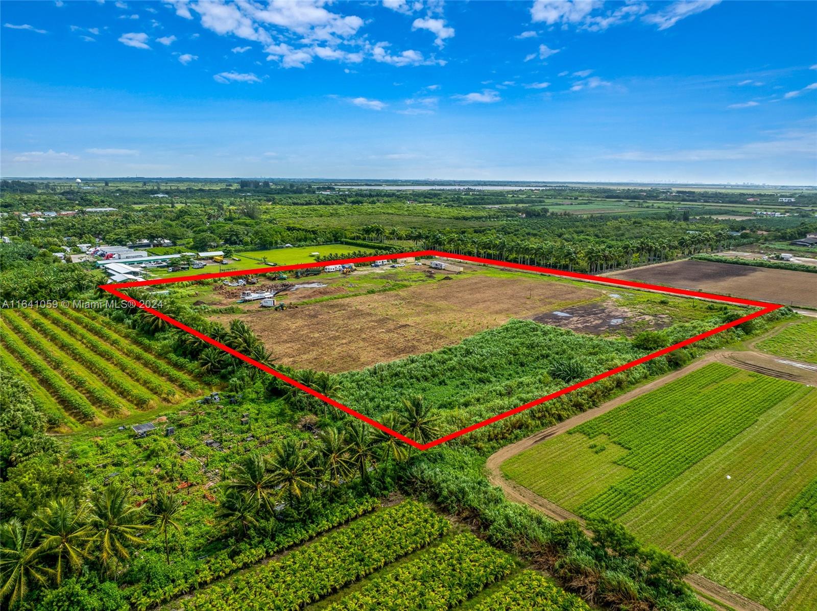 Located at 14810 SW 194th Ave Miami FL 33196, this unique 10-acre property has unlimited potential for
a plant nursery, a grove, bee farming, farming vehicle storage, and more. Currently, it operates as a plant and tree farm nursery, specializing in organic soil. This property has a special permit that allows for agricultural irrigation powered by groundwater from the Biscayne Aquifer, offering a sustainable and reliable water source for farming operations. An additional permit allows the space to be used as a yard trash transfer station, yard trash recycling facility, and processing yard trash (including clean wood.) Call today as this has several additional permits. Don't miss this exceptional opportunity with unlimited potential in a prime location by Krome Ave.