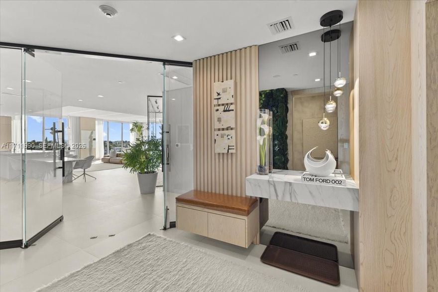 ONE OF FORT LAUDERDALES'S MOST STUNNING WATERFRONT, INTERIOR DESIGNER'S PENTHOUSE IN AQUAMAR WITH DEEDED DOCK. THIS UNIT BOASTS 3308 SQ FEET OF LIVING SPACE WITH A 920 SQ FOOT PRIVATE ROOFTOP TERRACE AND ANOTHER ALMOST 400 SQ FEET OF BALCONY SPACE ONE BEING 53 FT LONG.FLOOR TO CEILING IMPACT GLASS THROUGHOUT, PRIVATE ELEVATOR VESTIBULE WITH NEW GLASS ENTRY AND SWITCH GLASS, 15K PRESERVED MOSS WALL, TWO WINE FRIDGES AND GLASS WINE WALL. CUSTOM MILLWORK GALORE, ARCHITECTURAL LIGHTING, 150K TEAK ASTER CUCINE ITALIAN KITCHEN WITH MIELE COFFE MAKER AND STEAM OVEN, WOLF SUB ZERO APPLIANCES. THREE OVENS AND INDUCTION COOK TOP. 50 FT OF DEEDED DOCK SPACE NO FIXED BRIDGES TO THE OCEAN. PRIME UNIT IN THE BUILDING WITH UPGRADES GALORE.