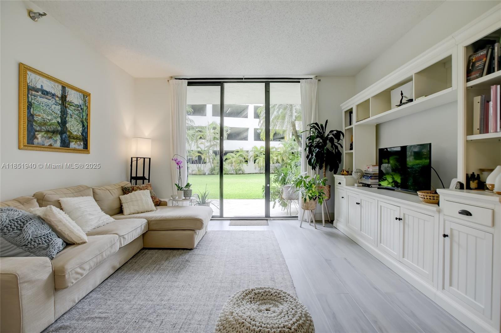 Beautiful spacious first-floor unit with a smart split-bedroom layout. The living opens to a private patio with direct access to the building’s green area, giving you the feel of a house with the convenience of condo living, perfect for relaxing and coffee mornings. Both bedrooms offer peaceful views of the garden. The unit features tile floors throughout, in-unit washer & dryer, and few upgrades including new closets, new toilets, new oven and a new water heater. The kitchen is separate yet flows nicely into the main living space, combining privacy with an open feel. Enjoy resort-style living with a heated pool, gym, sauna, beach volleyball court, valet, 24-hour security, and more. Prime location in the heart of Aventura, next to Founders Park and just across from Aventura Mall.