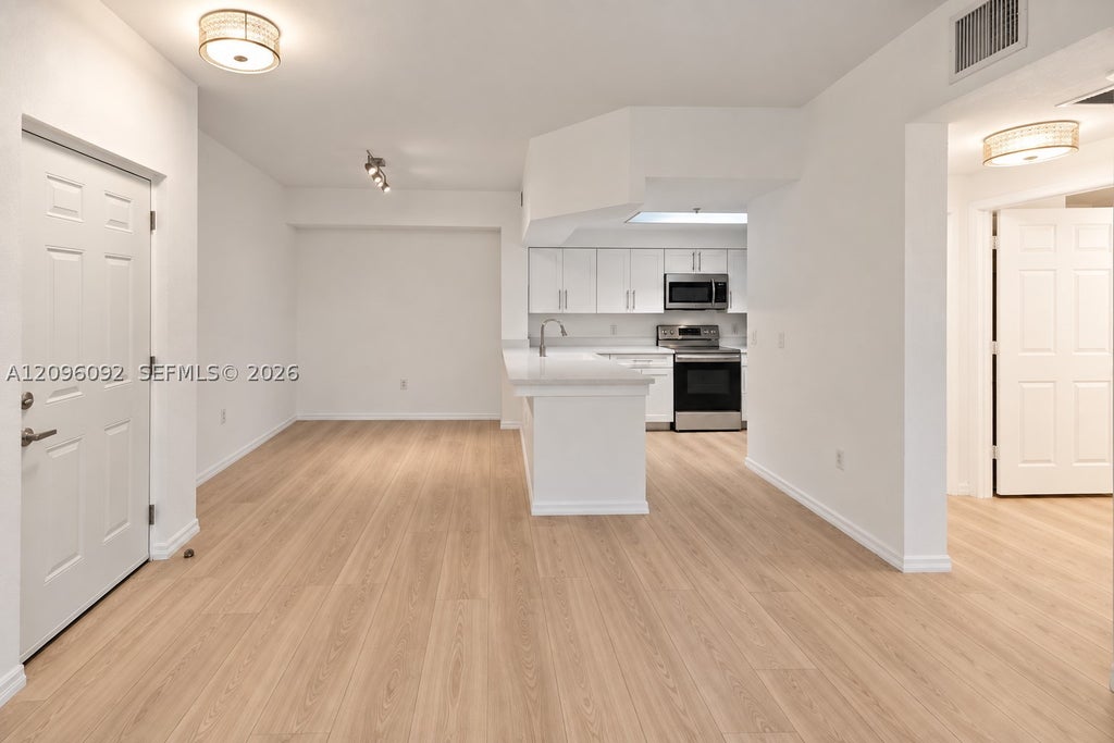 Photo of 3021 Alcazar Pl #305, Palm Beach Gardens, FL 33410 (MLS # A12096092)