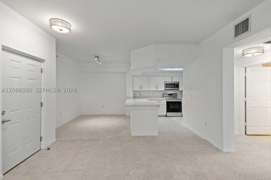 Photo of 3021 Alcazar Pl #305, Palm Beach Gardens, FL 33410 (MLS # A12096092)