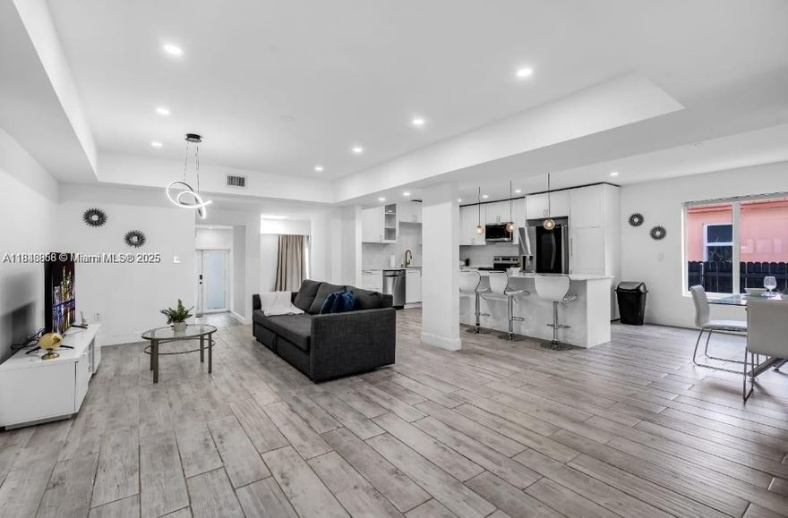 UNAPPROVED SHORT SALE opportunity in sought-after El Portal! Nestled between Miami Shores and Miami, this fully renovated 5-bed, 3.5-bath home offers 2,465 SF of open-concept living space. Features include brand-new plumbing, electrical, HVAC, kitchen, bathrooms, appliances, impact windows/doors, and modern landscaping. The spacious primary suite includes a walk-in closet, and the large front and back yards provide plenty of outdoor space. Enjoy sunny days by the sparkling pool on this 6,750 SF lot, located on a quiet, tree-lined residential street. All work permitted and fully approved—move-in ready! Please do not disturb tenants.