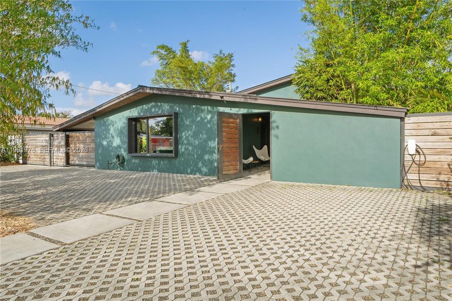 Retro-modern oasis with versatility built in. Featuring stainless steel appliances and available furnished or unfurnished, this home is perfect for seasonal living or full-time comfort. The expansive backyard and patio create the ultimate setting for entertaining. This home features spacious bedrooms, including a large primary suite. The kitchen is equipped with an overhead stove and functional layout for everyday living. Enjoy a welcoming front patio, perfect for relaxing. Conveniently located near FIU and top-rated colleges, making it ideal for students or couples. Please set an appointment for all showings DO NOT BOTHER TENANTS. PET FRIENDLY - LANDSCAPING INCLUDED WITH RENT. FIRST AND SECURITY FOR QUICK MOVE IN WITH GOOD CREDIT! TESLA CHARGER - ENERGY EFFICIENT HOME.