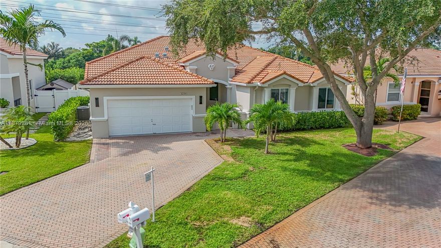 Completely Remodeled in Prestigious Gated Oakridge Community. This breathtaking 2,900 sq ft with soaring ceiling heights features 5 bed 3 bath this home offers both elegance and comfort. Designer kitchen, Impact windows, modern flooring, fully renovated bathrooms, fresh interior and exterior paint. Professionally designed landscaping, enjoy a large backyard oasis, perfect for entertaining, plus a 2 car garage for all your toys and vehicles. Oakridge is one of the most sought-after communities in the area, offering security, a family-friendly atmosphere, and the convenience of walking distance to your house of worship. Has permits and plans for a pool. Definitely one of the nicest homes in the neighborhood.