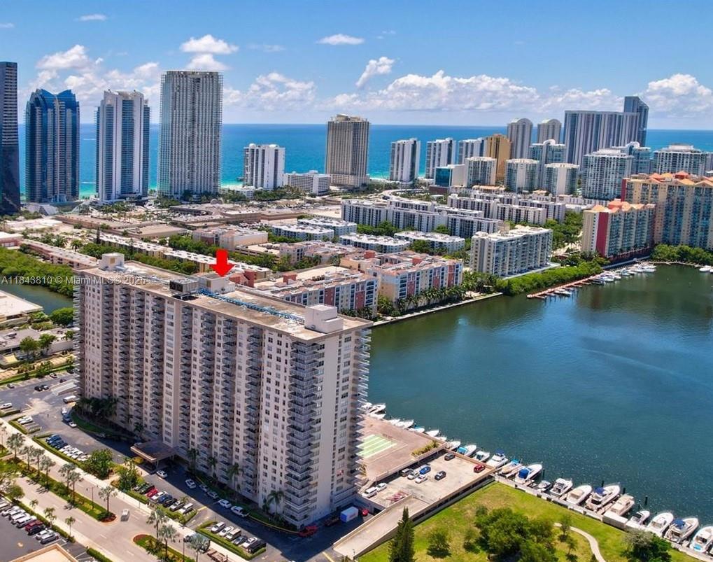 Step into newly renovated, fully designer-decorated apartment featuring brand-new finishes and high-end appliances. Great quality modern Furniture. Large balcony with spectacular unobstructed Intracoastal views perfect for morning coffee or evening sunsets. Bosch Washer and Dryer located inside apartment bathroom. Gourmet kitchen with tile surfaces and top-of-the-line appliances: Liebherr refrigerator, Bosch dishwasher, Whirlpool cooktop, oven, and microwave. White Gloss Stretch ceiling in the living room makes apartment very bright with natural day light. Amazing large pool and Gym. Walk 5 minutes to the beach for sand, see breezes and relaxation. Convenient location with many grocery stores and restaurants. A Grade School. Apartment can be shown same day. Call or text Listing Agent.