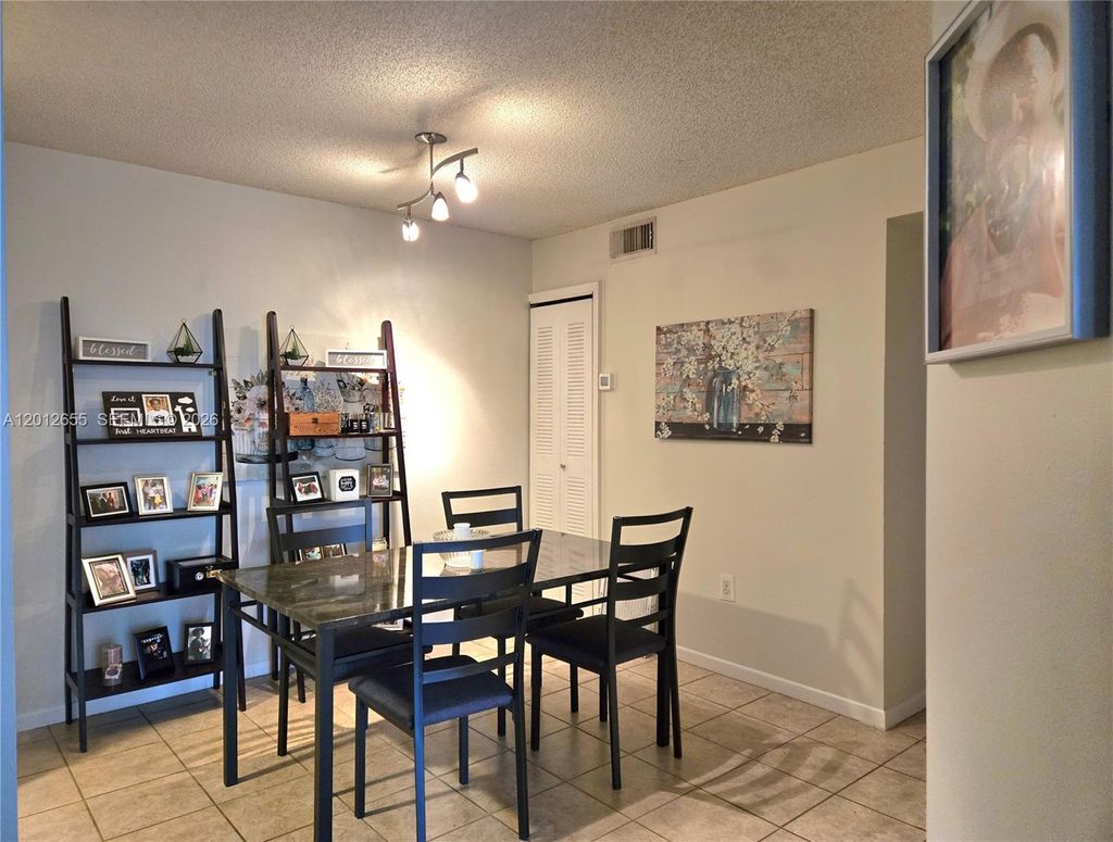 Photo of 1715 Village Blvd #205, West Palm Beach, FL 33409 (MLS # A12012655)