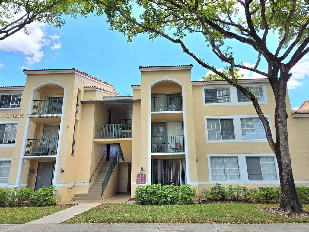 Photo of 1715 Village Blvd #205, West Palm Beach, FL 33409 (MLS # A12012655)