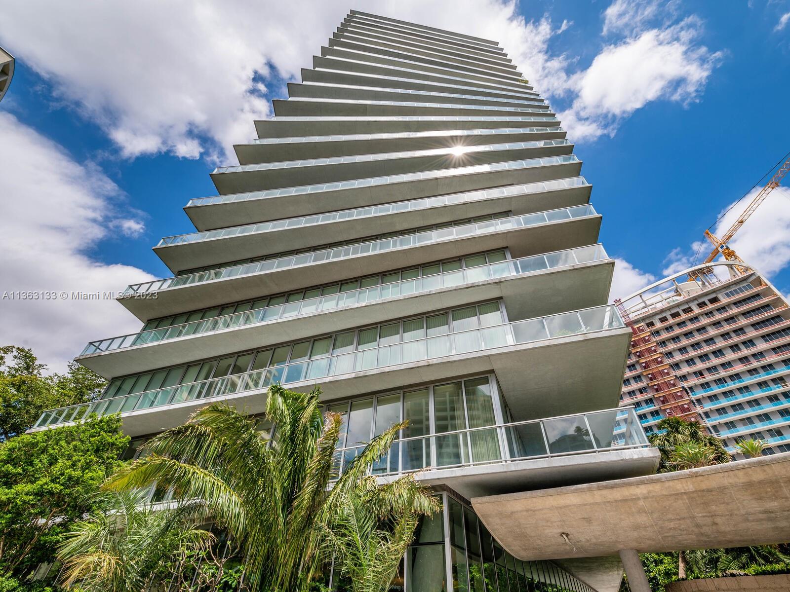 Enjoy the luxurious lifestyle of Coconut Grove with spectacular views of Biscayne Bay, right in Miami's center! This beautiful condo featuring 3 bedrooms (all ensuite) is equipped with a spacious kitchen, high-end Miele appliances, additional guest bath, laundry. With dramatic 12’ ceilings and plenty of outdoor space, you can appreciate this sky home's unmatched style as well as its convenient location near popular dining spots, shopping areas , cinemas and prestigious schools. To top it off there are 2 pkg spaces and extra storage! Amenities include pools both indoor & roof-top level, top of the line fitness room, kids play room, library... Indulge in the lifestyle of this remarkable waterfront residence.