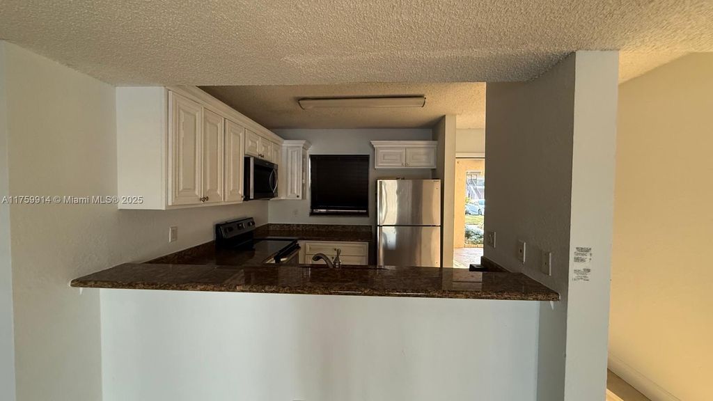 Photo of 1600 Windorah Way #C, West Palm Beach, FL 33411 (MLS # A11759914)