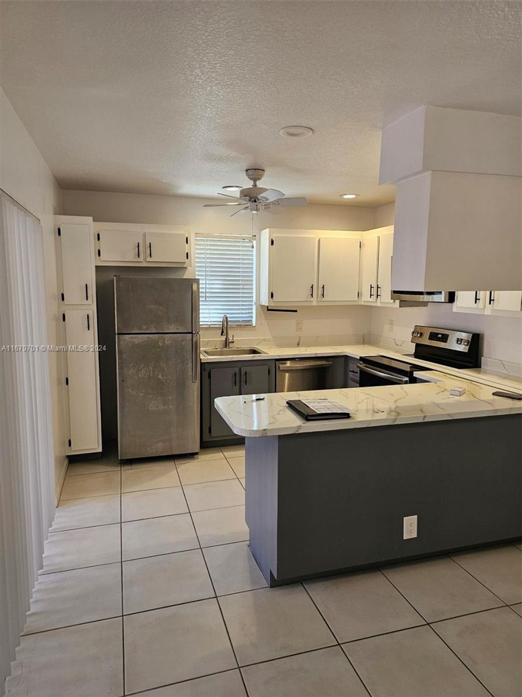 Photo of 7572 E Courtyard Run E #7572, Boca Raton, FL 33433 (MLS # A11679701)