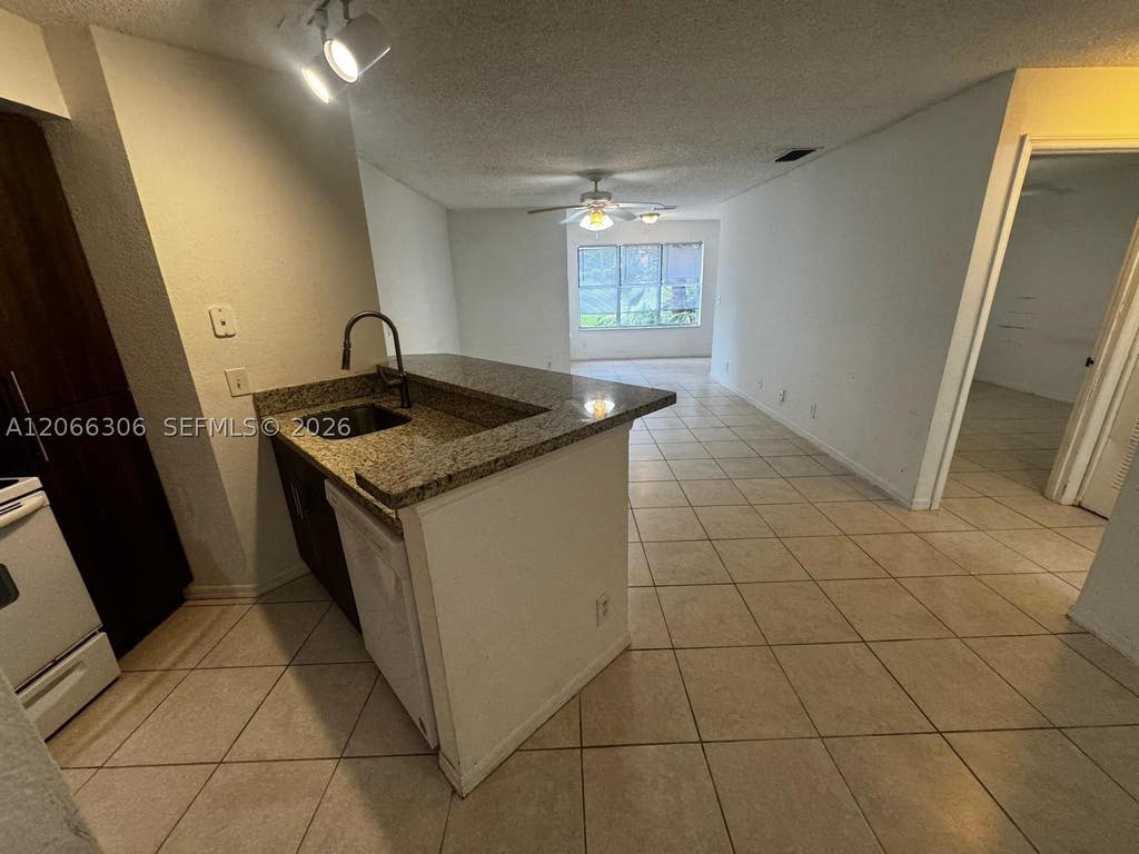 Photo of 3370 N Pinewalk Dr N #1213, Margate, FL 33063 (MLS # A12066306)