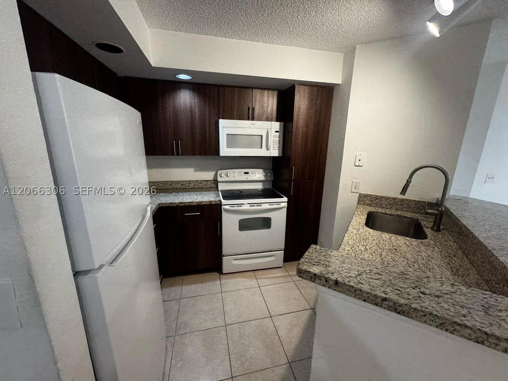 Photo of 3370 N Pinewalk Dr N #1213, Margate, FL 33063 (MLS # A12066306)
