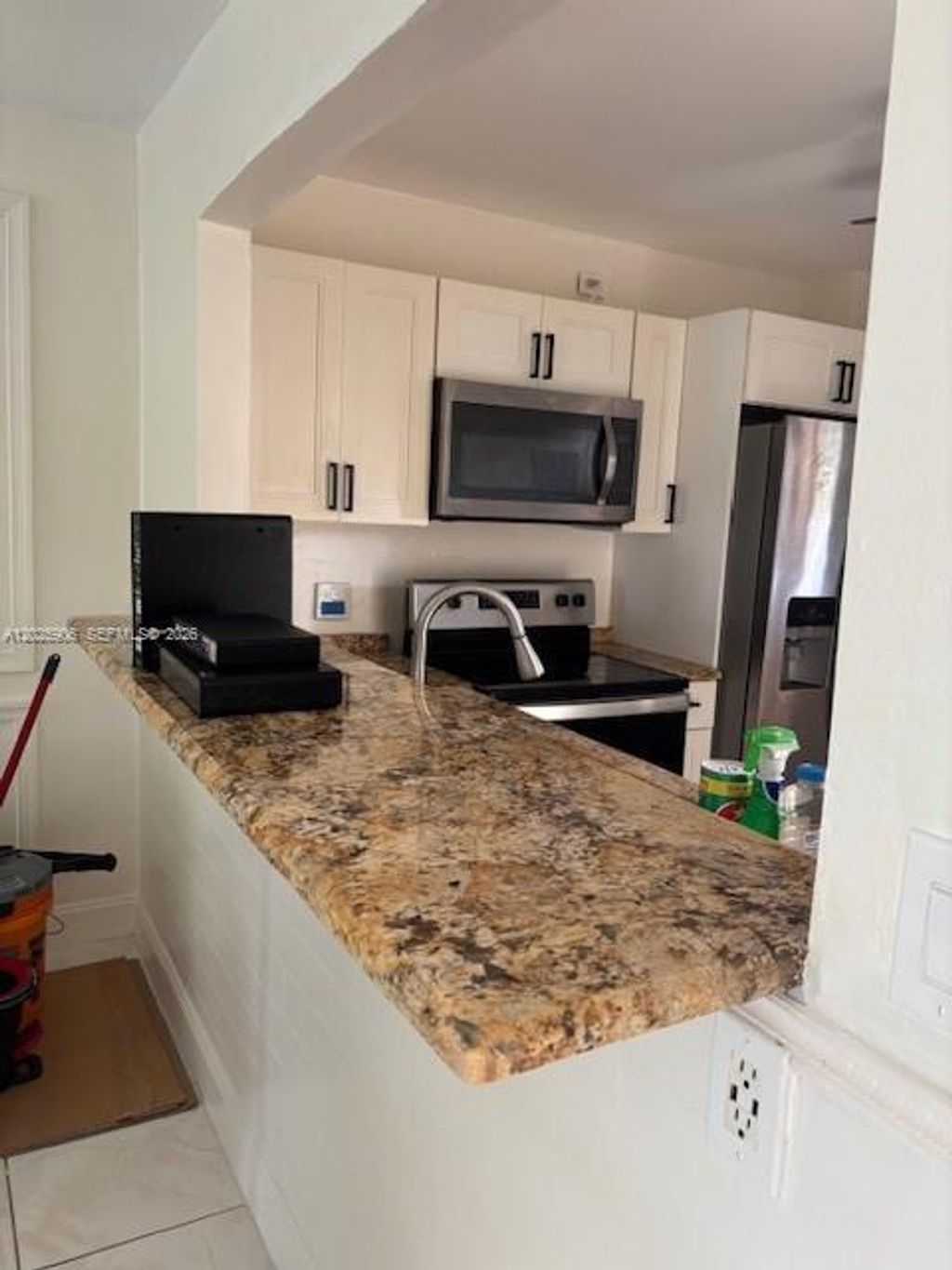Photo of 6101 N Falls Circle Dr #312, Lauderhill, FL 33319 (MLS # A12025906)