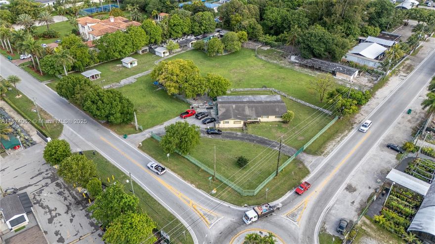 Start dreaming! Prime Development Opportunity nestled in the heart of Horse Country. This rare offering is over 2 acres of land (96,703 SF) in a coveted corner lot, surrounded by multimillion-dollar estates and agricultural businesses, perfect for building your dream home or as an investment project. The expansive grounds provide ample space for boats, RVs and ATVs. It is zoned for agricultural use, with room for further improvements. Conveniently located within minutes of Kendall Regional Hospital, and the Florida Turnpike. Whether you choose to remodel or build new, this property offers unmatched potential and value in a highly sought-after area of tranquility, luxury, and rustic elegance. Don’t miss this unique opportunity!