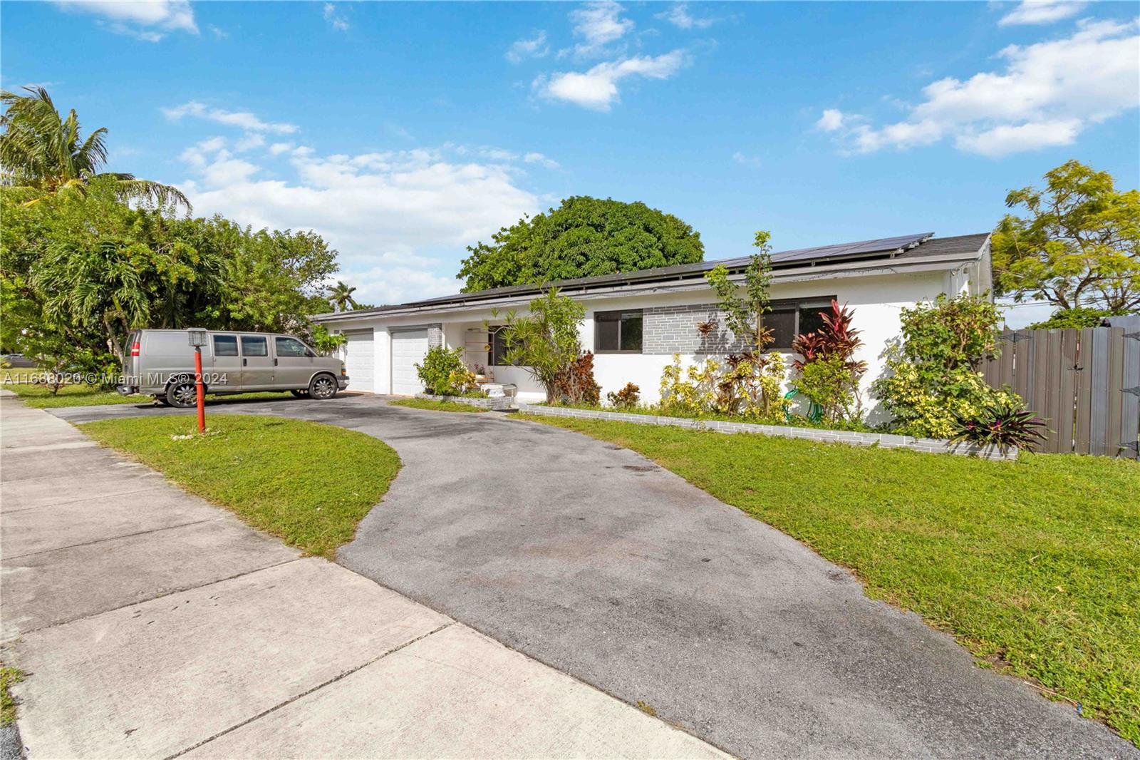 Welcome to this beautiful corner unit home featuring 3 bedrooms and 2 bathrooms. The inviting living room offers plenty of natural light through the large impacted windows and doors, creating a warm and welcoming atmosphere for family gatherings and entertaining. The kitchen is well-designed with modern appliances, and a perfect layout overlooking the backyard. NO HOA fees! A spacious double car garage, the roof is 5 years old as the solar panels. Step outside to your private patio with high-graded artificial turf, and a refreshing pool, ideal for relaxing and enjoying sunny days. It has an outdoor kitchen with a brick pizza oven and a perfect shed for additional storage.