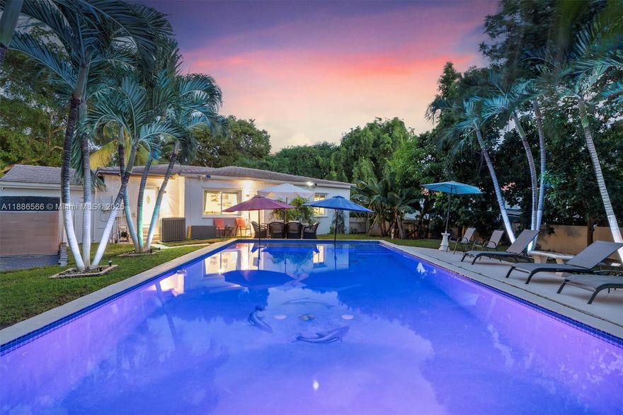 Your poolside oasis awaits! This beautifully updated 4-bedroom, 3-bath Miami Shores home offers modern finishes, impact windows and doors, and comes fully furnished. The open layout provides a seamless flow between living, dining, and outdoor spaces—perfect for both everyday comfort and entertaining. Step outside to a sparkling pool and spacious backyard designed for relaxation and gatherings under the Miami sun. Ideally located near top-rated schools and just 15–20 minutes from Miami’s most desirable destinations, this home combines style, convenience, and move-in-ready appeal.