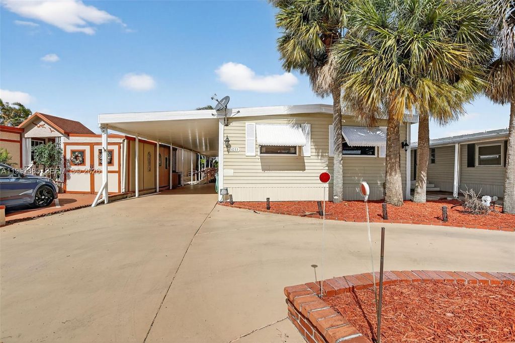 Photo of 3033 Lakeshore Dr, Dania Beach, FL 33312 (MLS # A11951385)