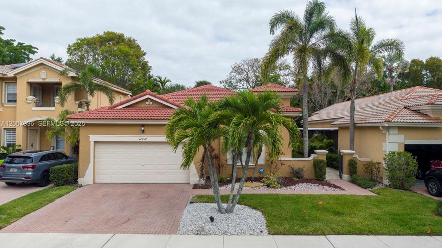 Beautiful one story home in Heron Bay COMPLETELY RENOVATED with a NEW ROOF!!! 3 Bedroom, 2 Bathroom, 2 Car Garage in Villa Sorrento of Guard Gated Heron Bay. Newer Roof/ 2021 with 12 year Warranty transferable to new buyer. New laminate flooring and white kitchen cabinets with granite counters that were never used. Master has separate tub & shower, and walk in closet. Lovely screened lanai off the dining room, kitchen & master. New hot water heat. Back up to the berm for extra privacy. Extended covered patio. Highly desirable Guard Gated Community of Heron Bay provides 3 Guard Gates, 2 Club Houses, Resort Style Pools, Tennis Courts, Basketball Courts, Gyms, Party Rooms and much more. Close to A Rated Schools and Shopping.