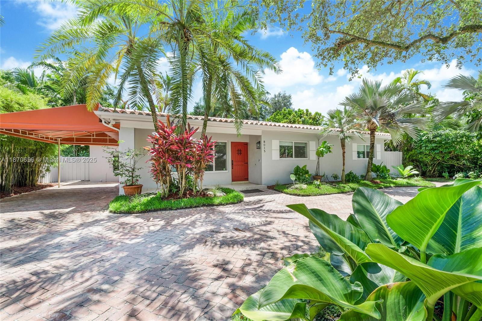 A ‘Best in Class’ home for the discerning Buyer! Located east of US1 in the uber popular Beverly Gardens community, this gem checks all of the boxes – renovated house, premier neighborhood, and A+ location. Wonderful features include the grandest great room, updated kitchen with wood cabinetry, quartz counters, and snack bar, beautiful baths, and indoor laundry. Other honorable mentions are impact glass, newer roof, porcelain floors, the sweetest front porch, and a lushly landscaped backyard with Jacuzzi, pergola, and wonderful patio. A brick-paver circular driveway and canopy covered carport are icing on the cake. With only steps to Fuchs and Dante Fascell Parks, walking distance to downtown South Miami, and minutes to the corridors of Coral Gables and Pinecrest, this could be the one!