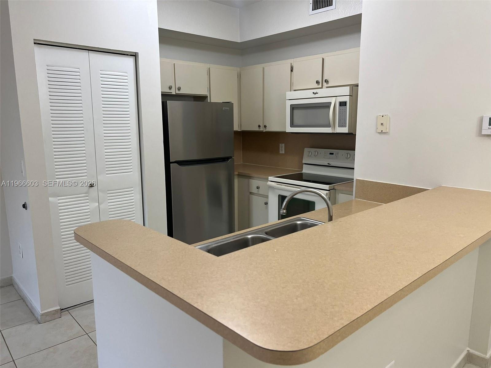 PALM GARDENS AT DORAL CON - Residential