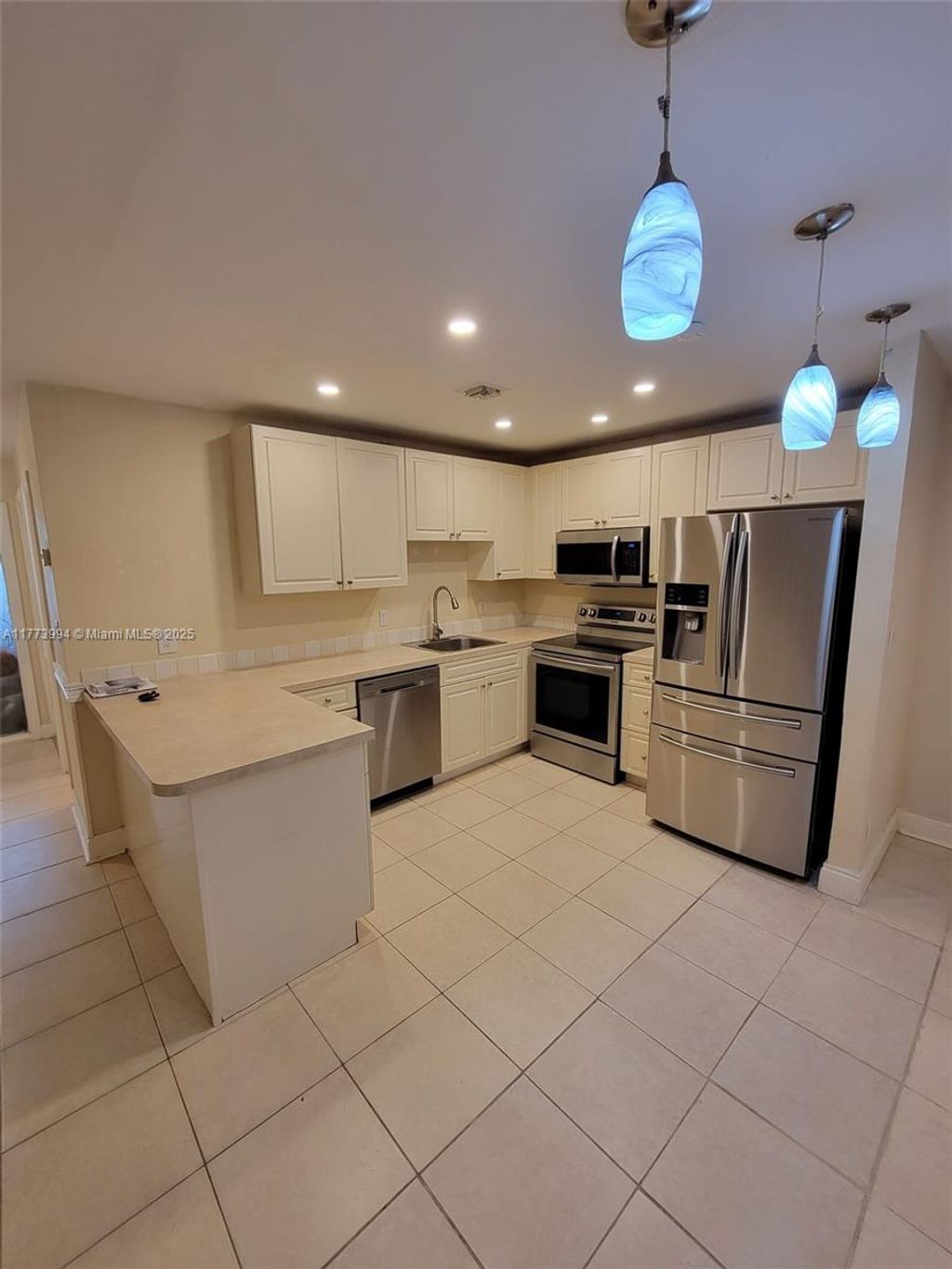 Photo of 8700 NW 40th St #8700, Coral Springs, FL 33065 (MLS # A11773994)