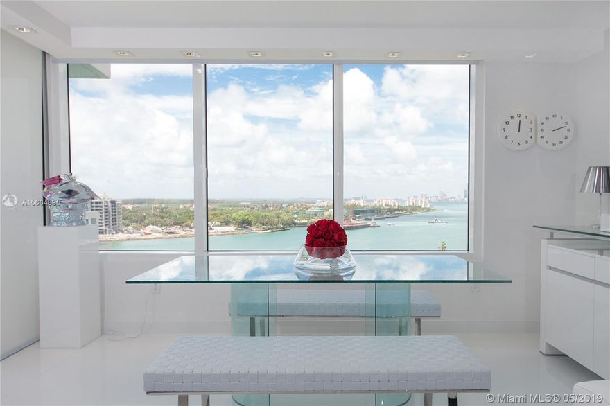 Furnished. Renovated including impact windows. Split bedroom floor plan. 40" X 40" white glass marble floors. Redesigned open kitchen with Miele and Sub Zero appliances. Spectacular master suite with open glass enclosed spa shower. Custom cabinetry throughout. Unobstructed views of Govt Cut, South Pointe Park and the Miami skyline. Full service bldg. with 2 pools, tennis courts, fitness center, business and media centers. NO PETS.