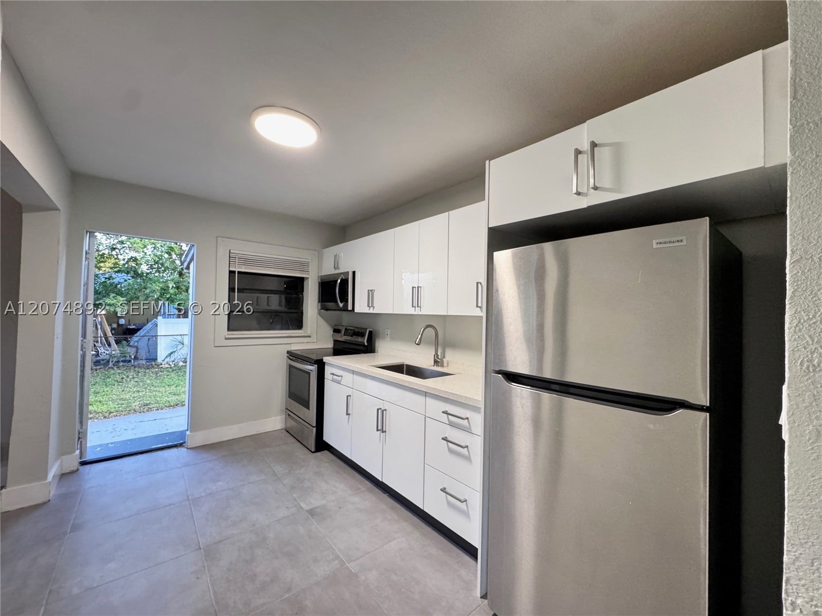 3040 NW 7th St