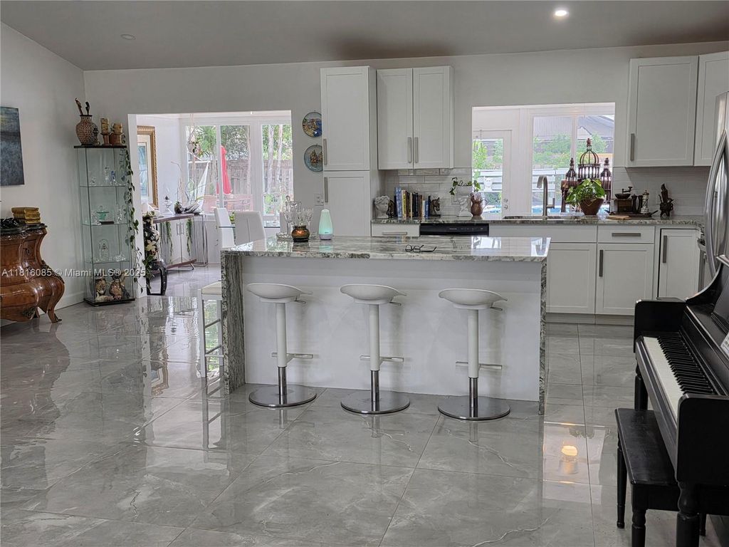 Photo of 117 SW Fairview Ave, Port St Lucie, FL 34983 (MLS # A11816085)