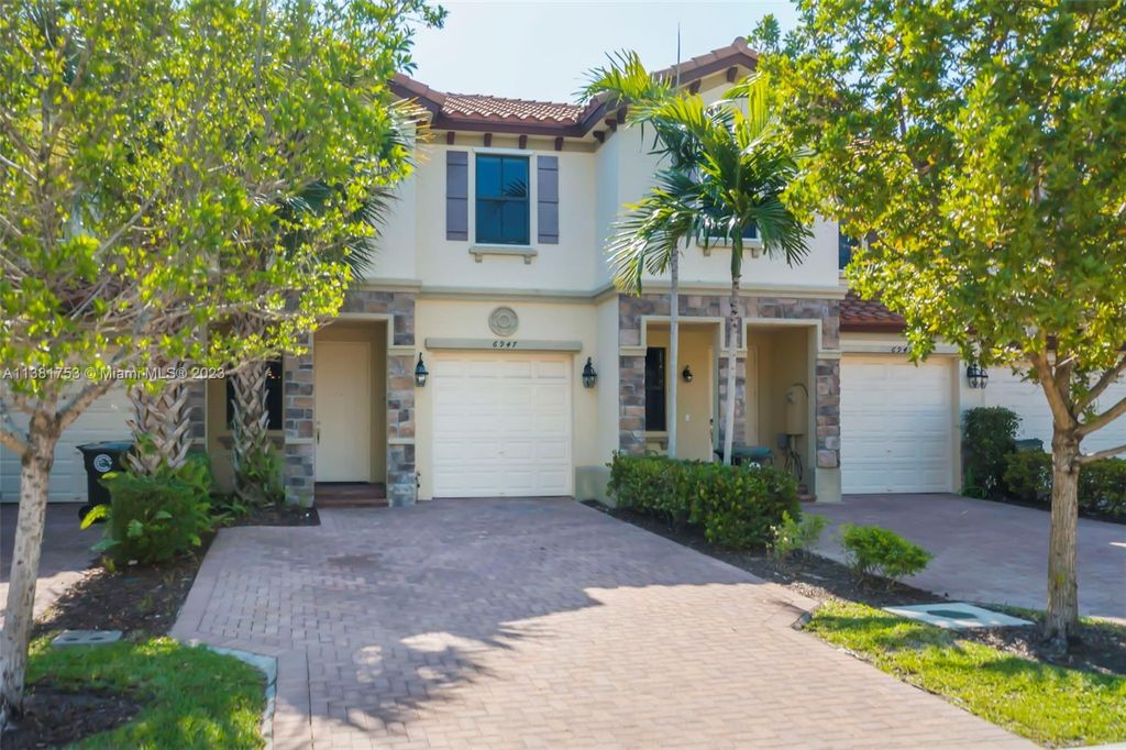 Photo of 6947 Halton Park Ln, Coconut Creek, FL 33073 (MLS # A11381753)