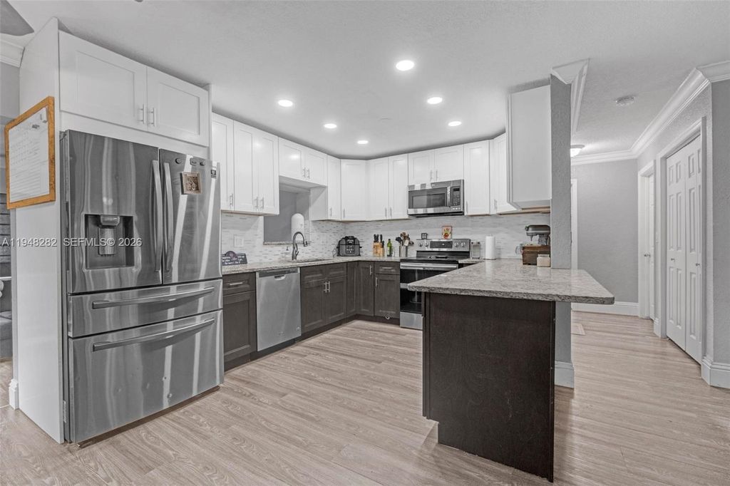 Photo of 131 SE 11th St, Deerfield Beach, FL 33441 (MLS # A11948282)