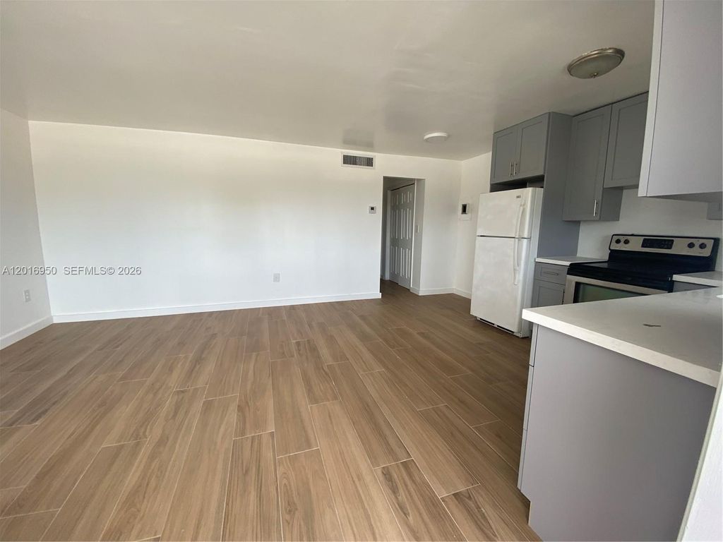 Photo of 7011 Pembroke Rd #202, Pembroke Pines, FL 33023 (MLS # A12016950)