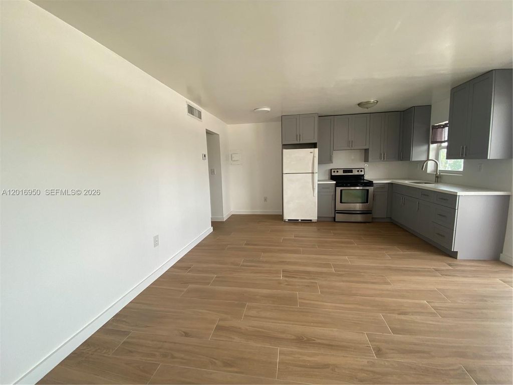 Photo of 7011 Pembroke Rd #202, Pembroke Pines, FL 33023 (MLS # A12016950)