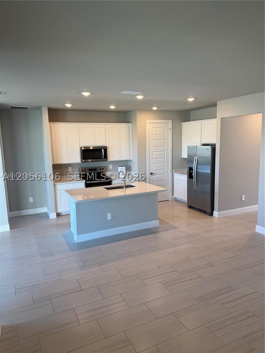 9008 Dahlia Cir