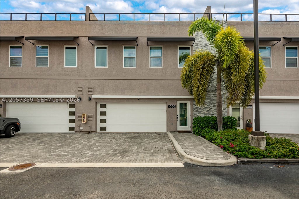 Photo of 1066 NE 35th St, Oakland Park, FL 33334 (MLS # A12057359)