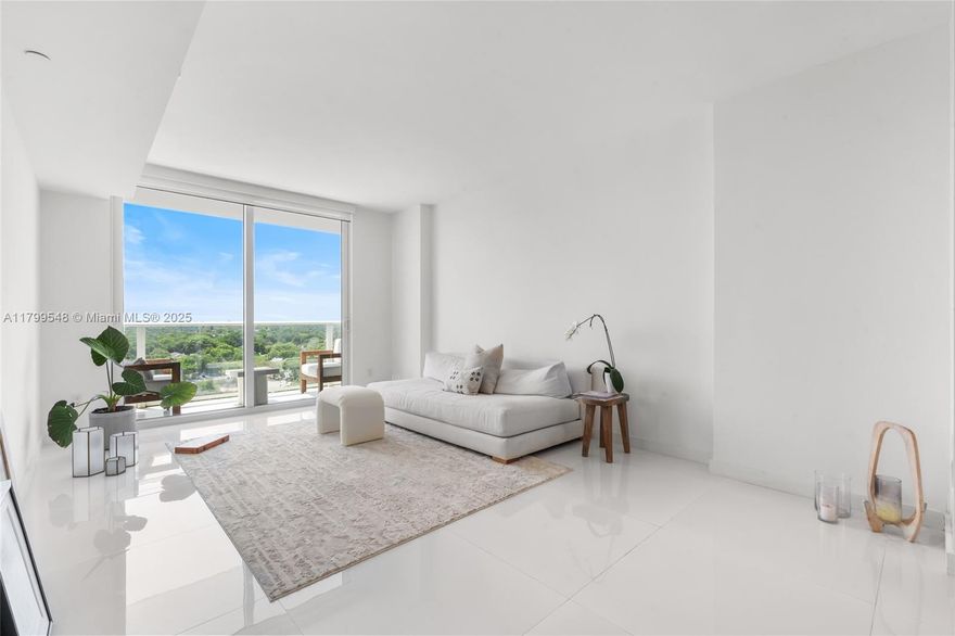 Located in vibrant Biscayne Blvd, this modern unit is steps from the Design District and just minutes from Midtown and Wynwood. It features an open layout, floor-to-ceiling windows, a sleek kitchen with high-end appliances, and a private balcony with city and treetop views. Enjoy luxury amenities like two skyline-view pools, a fitness center, and a rooftop deck with jacuzzis. With 24/7 concierge, security, and easy access to Brickell, Miami Beach, and MIA, this is upscale living at its best.
