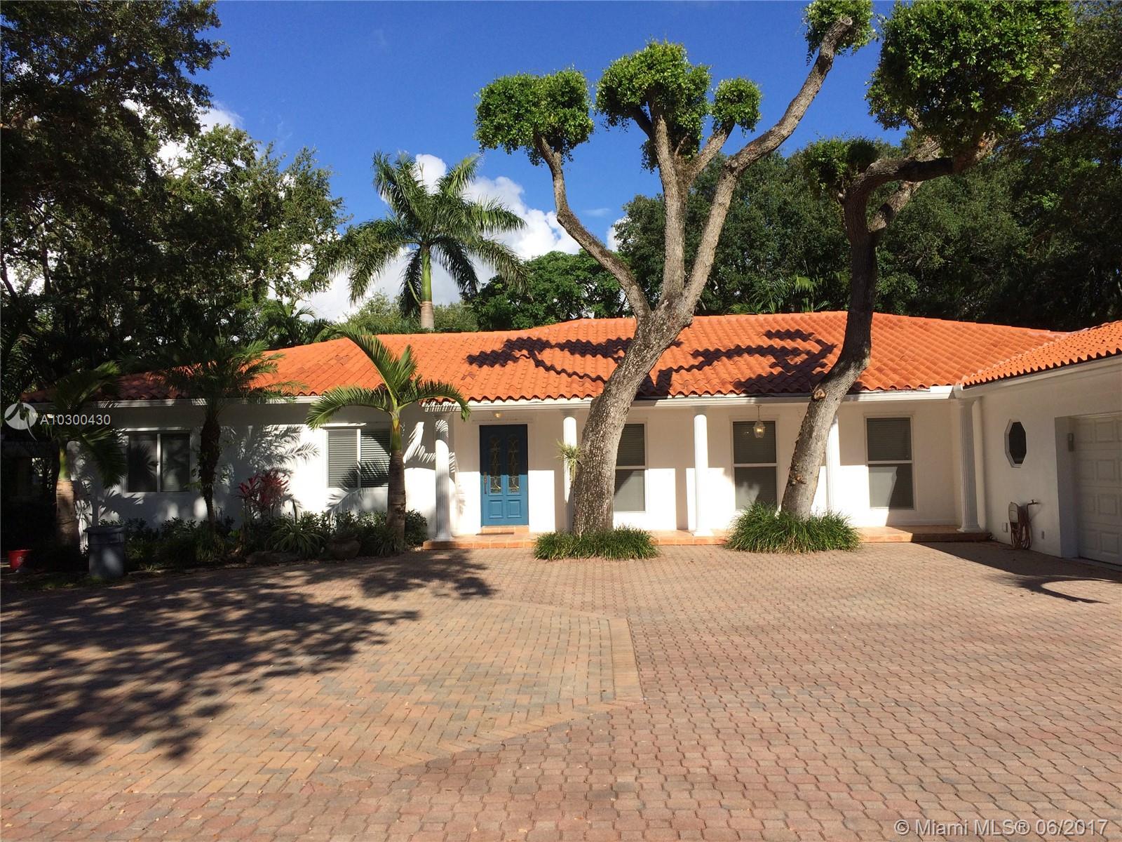 This elegant, beautifully updated home is a gated tropical paradise for family living & entertaining on a grand scale. Features marble floors in social areas, wood in BR’s, fabulous cook’s kitchen, 3 BR’s on one side of home w/Master suite & BR #5 on other. Covered patio in backyard beside sparkling pool. Tons of extra storage in 2-car garage.