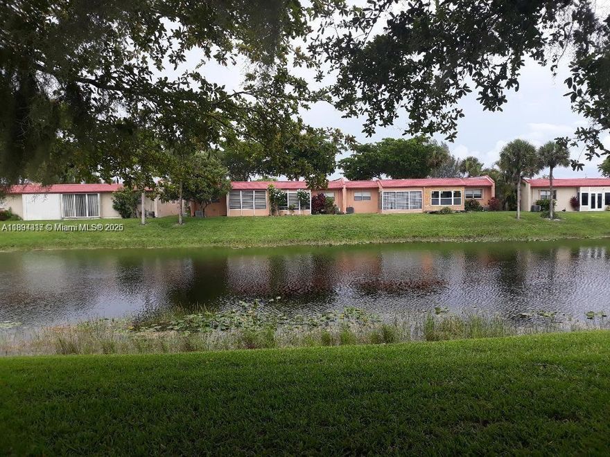 Excellent 1st-floor 2/2 convertible waterfront condo in a 55+ guard-gated community. Fresh paint, new carpet, enclosed patio with canal views. Kitchen features tile floors, built-in desk & new backsplash. Spacious master suite with en-suite bath shower/tub combo. New water heater, newer A/C. Packed with amenities to enhance your lifestyle: an Olympic-size pool, sauna, whirlpool, and a courtesy bus two days a week to nearby grocery stores, malls, and shops.