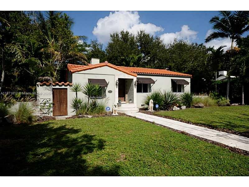 Charming 2-Bedroom + Den in Miami Shores Welcome to this inviting home featuring 2 bedrooms, 1 bathroom, and a versatile den perfect for an office or guest space. Nestled on a large lot with beautiful landscaping, stunning mature trees, and convenient alley access, this property offers both privacy and curb appeal. The interior boasts tile flooring throughout, while the generous outdoor space provides plenty of room for entertaining or future expansion. This home enjoys a prime location close to shops, dining, schools, and major highways. A wonderful opportunity to own in one of Miami’s most desirable neighborhoods!