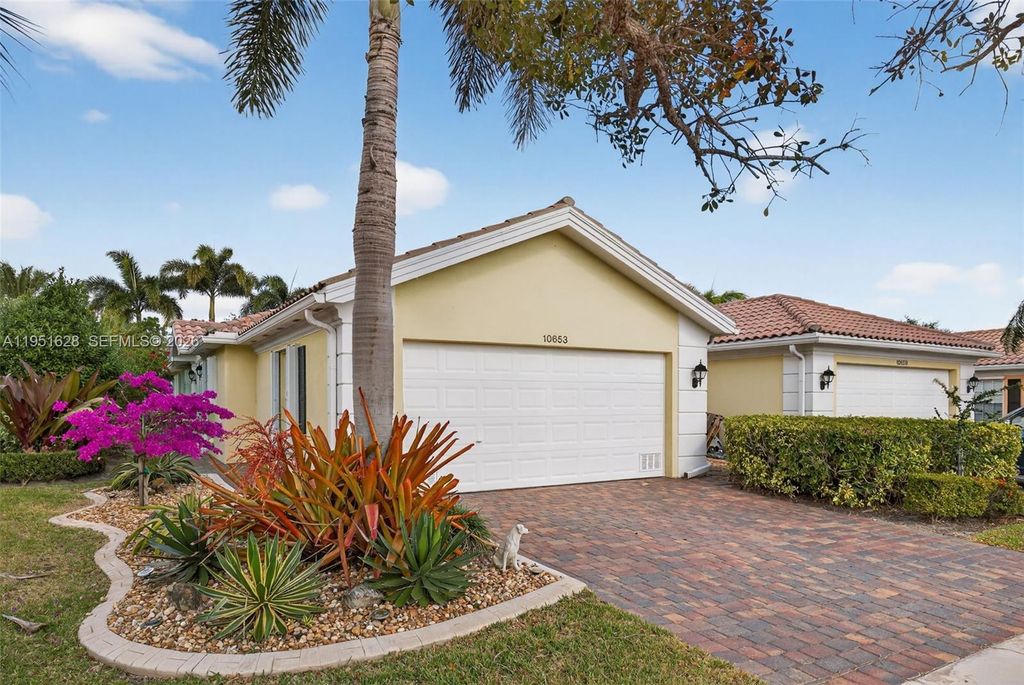 Photo of 10653 SW Hartwick Dr, Port St Lucie, FL 34987 (MLS # A11951628)