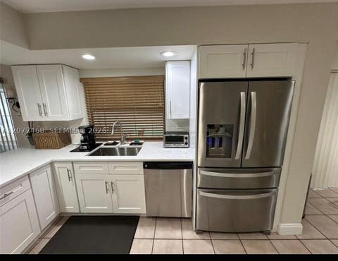 Tiny photo for 913 NW 110th Ln, Coral Springs, FL 33071 (MLS # A12077468)